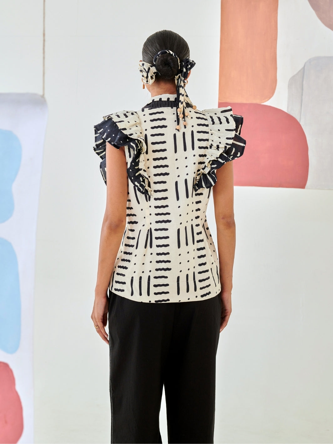 Black & White Printed Ruffled Jacket With Black Flower Patch Pants