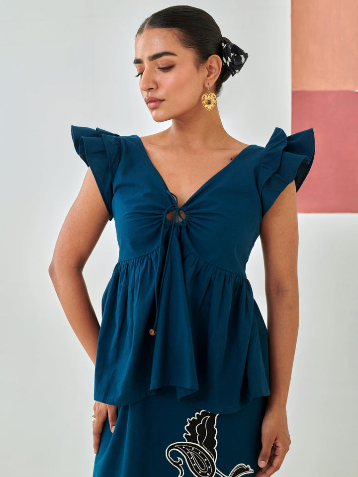 Teal Tie Up Top Paired With A Line Skirt With Patchwork Detail