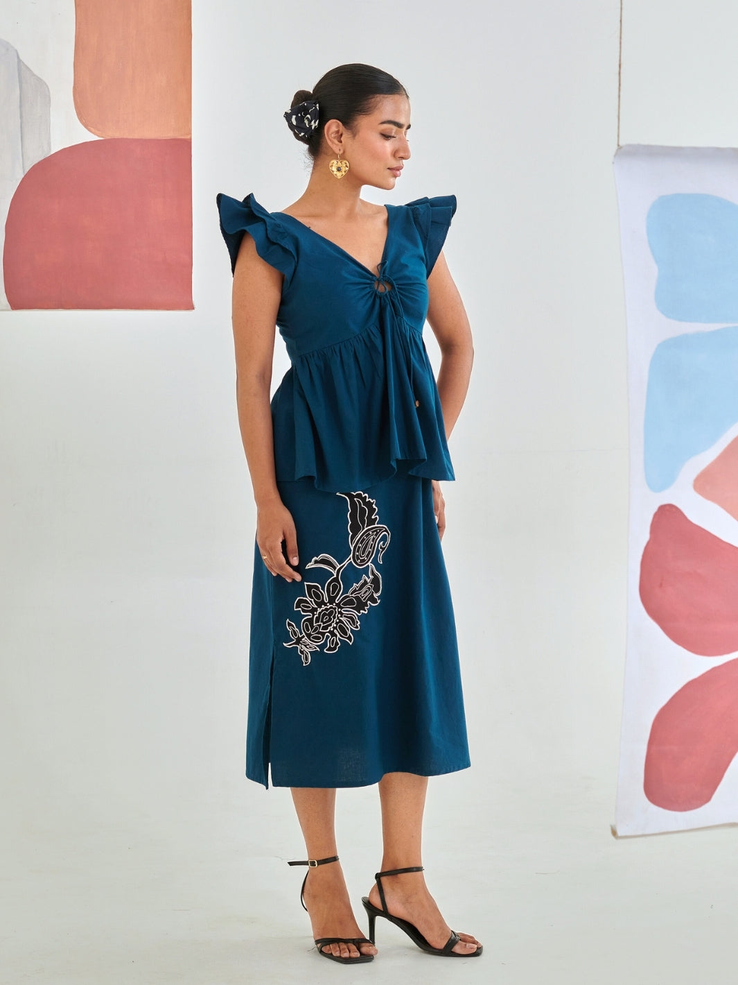 Teal Tie Up Top Paired With A Line Skirt With Patchwork Detail