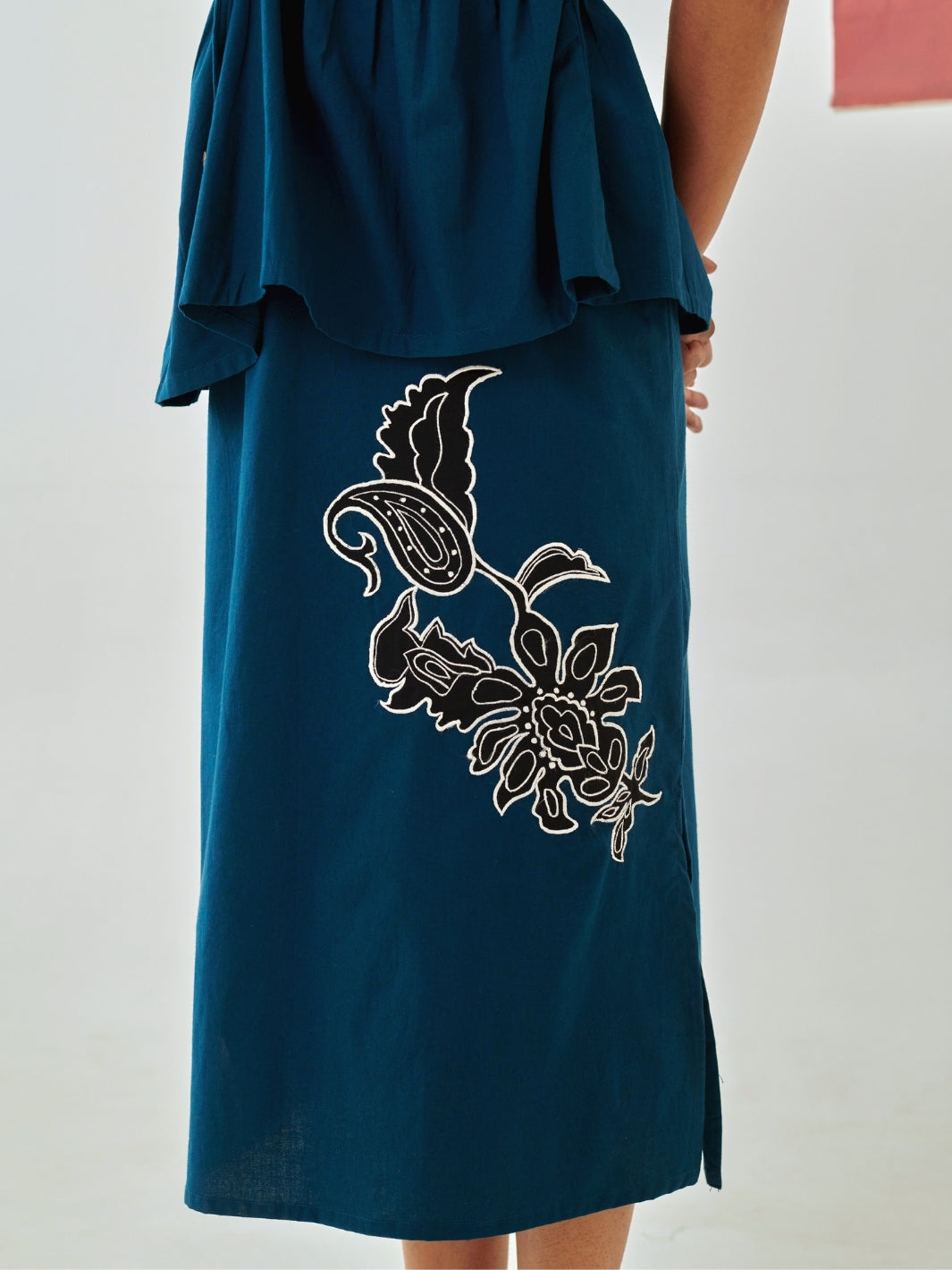 Teal Tie Up Top Paired With A Line Skirt With Patchwork Detail